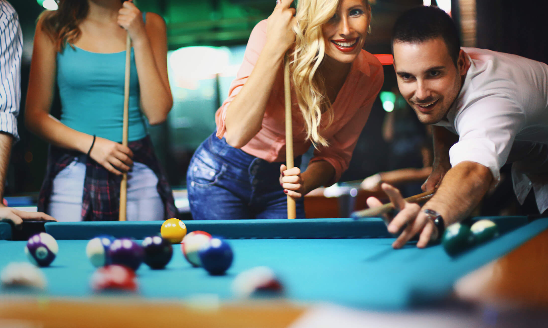 People playing pool