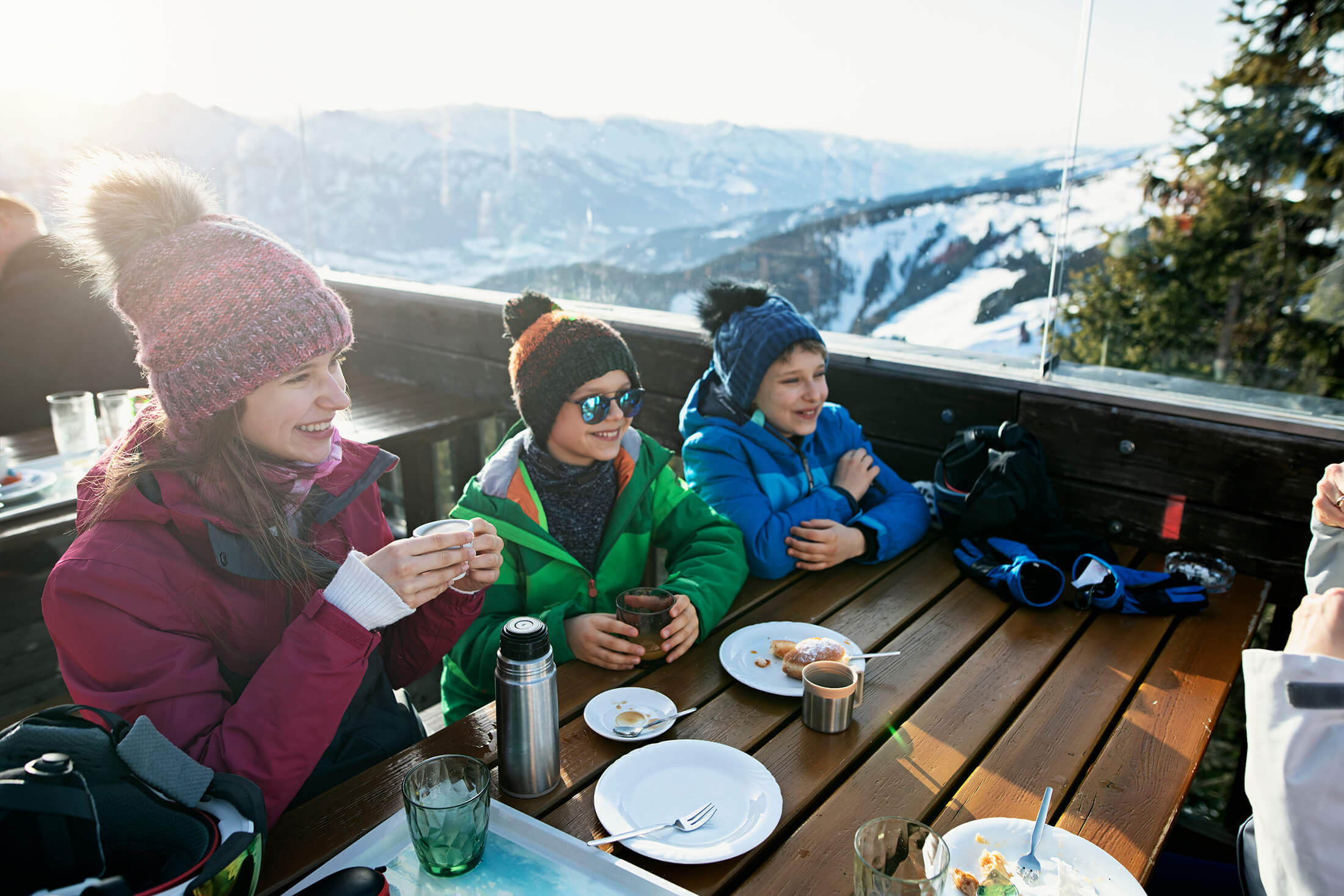 Family eating outside in the winter